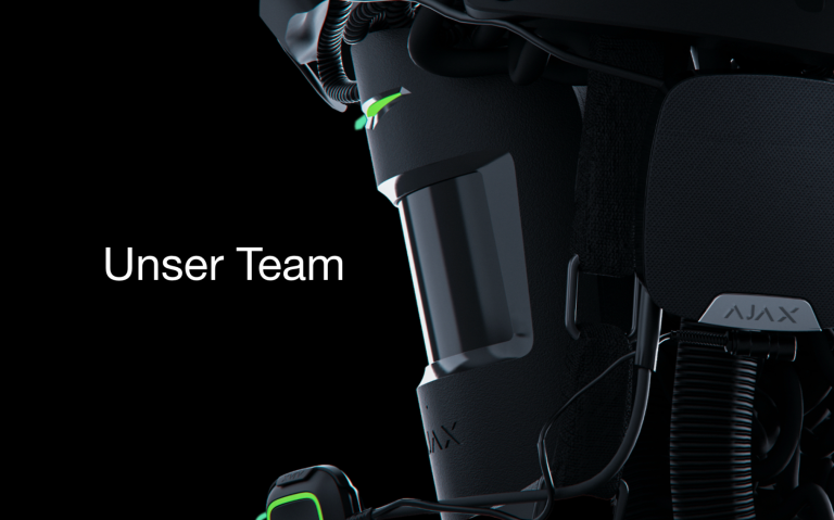 Hier gelangen Sie zur Rubrik: Einbruchschutz Schwarzer Hintergrund mit dem Schriftzug "Unser Team" in moderner Schrift.